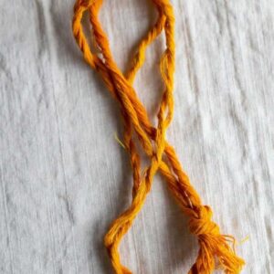 Yellow thread for puja