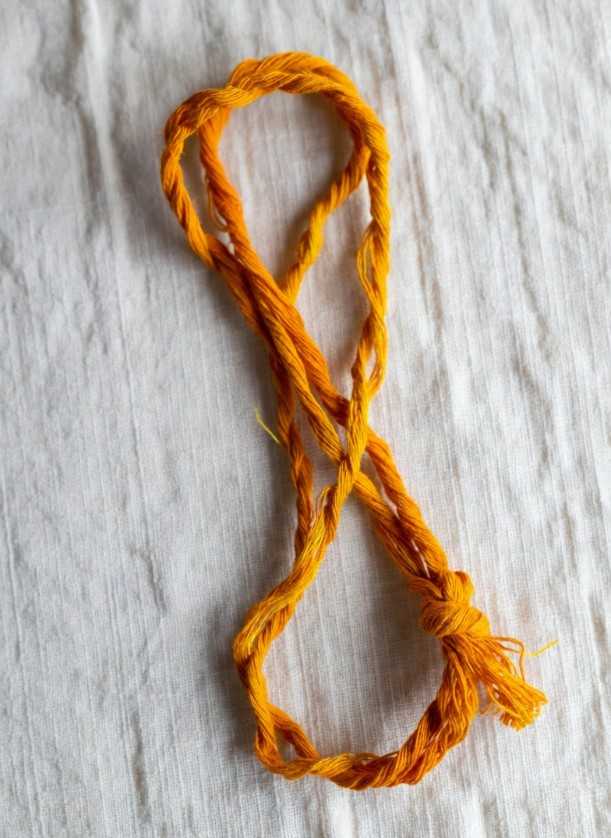 Yellow thread for puja